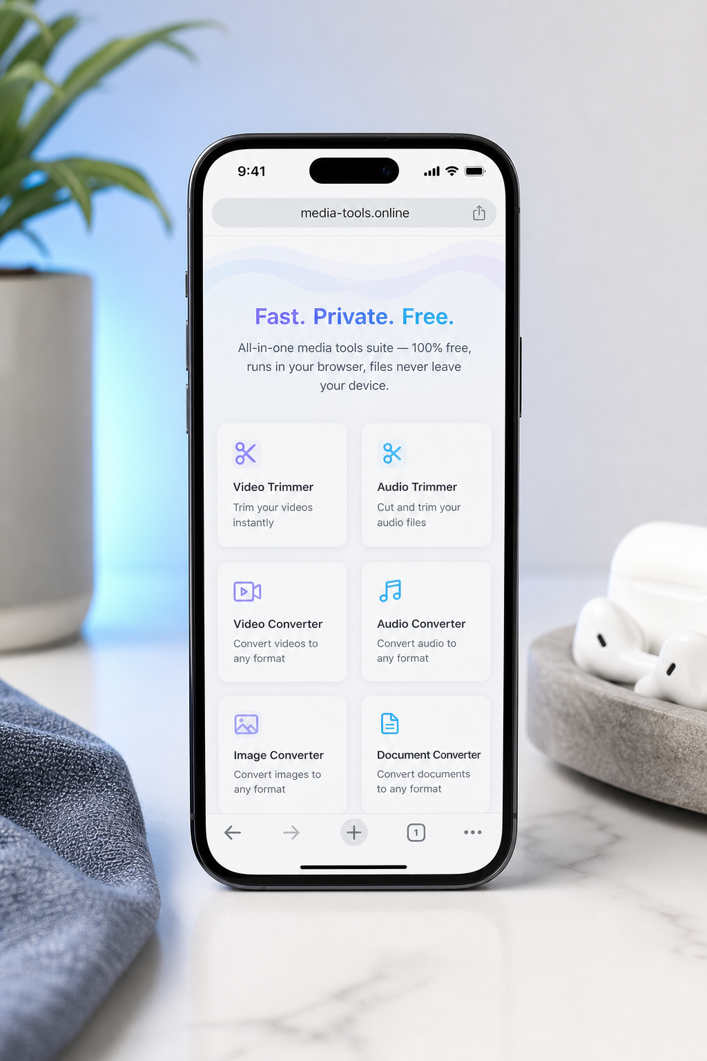 竖屏iPhone，移动Safari打开显示media-tools.online主页，工具卡片清晰可见。白色背景，屏幕亮度足够高以便阅读。