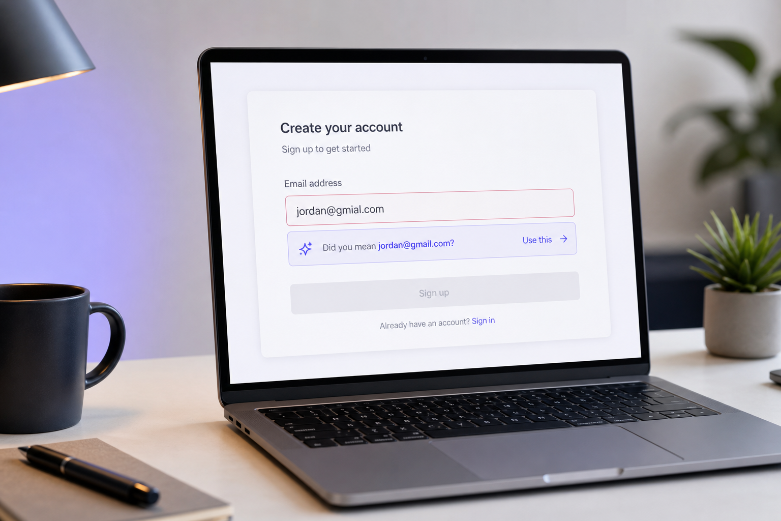 UI mockup showing a signup form email field containing jordan@gmial.com with a highlighted inline suggestion beneath it reading "Did you mean jordan@gmail.com?" and a subtle one-click accept control. Clean, modern web UI, light background.